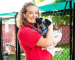 Emily Brooker with an Operation Kindness puppy