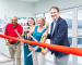 People cutting the ribbon at the VMP ribbon cutting.