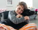 Child hugging a shelter dog