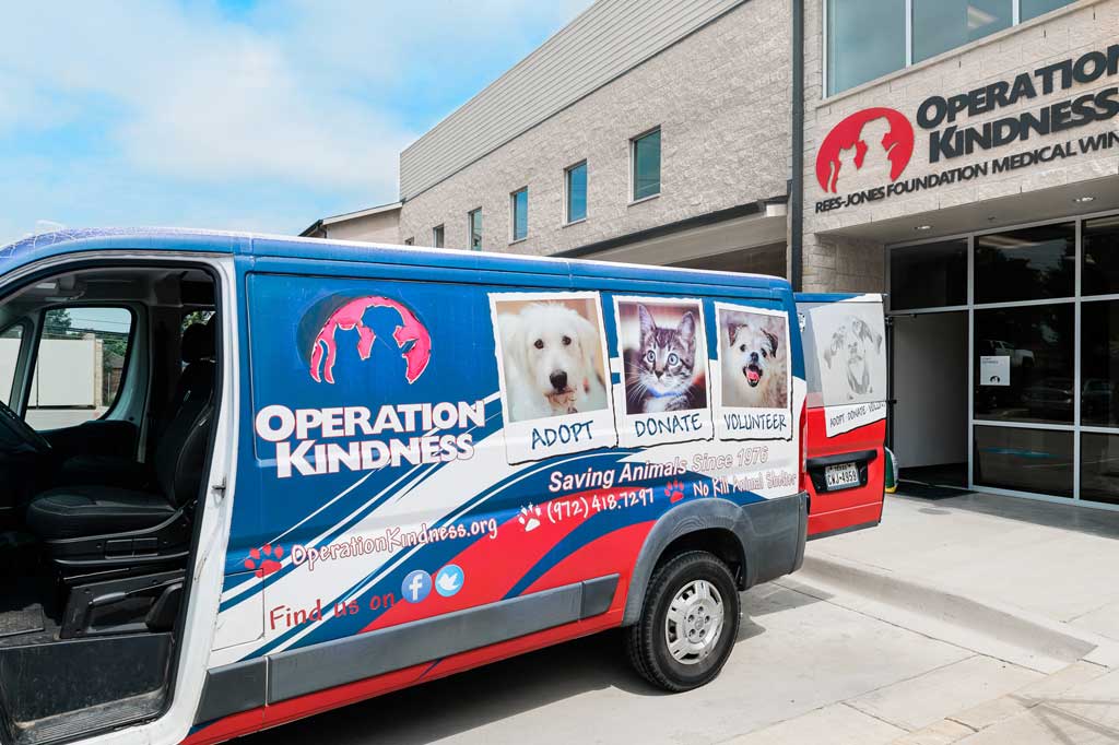 Operation Kindness vehicle loading pets for transport